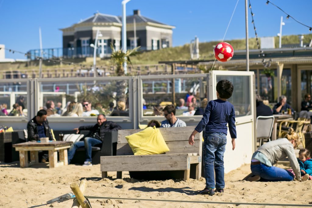 The Fat Mermaid kid playing with ball