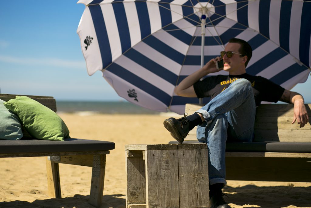 The Fat Mermaid phone call on the beach